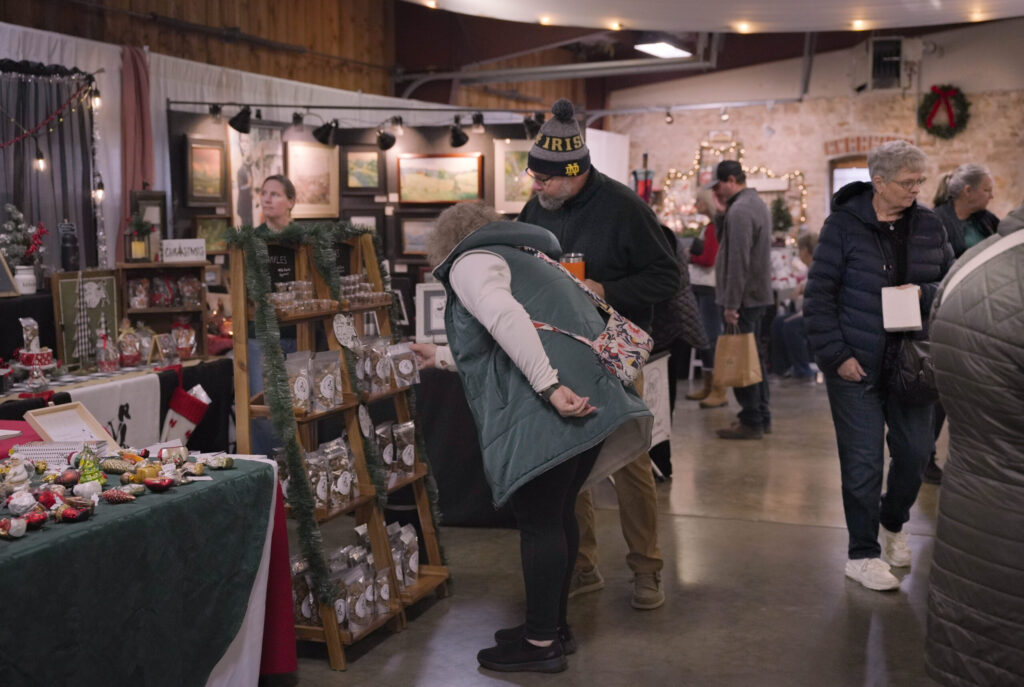 Vendor booth with handmade holiday gifts at the Kristkindl Markt at Stone Hill Winery