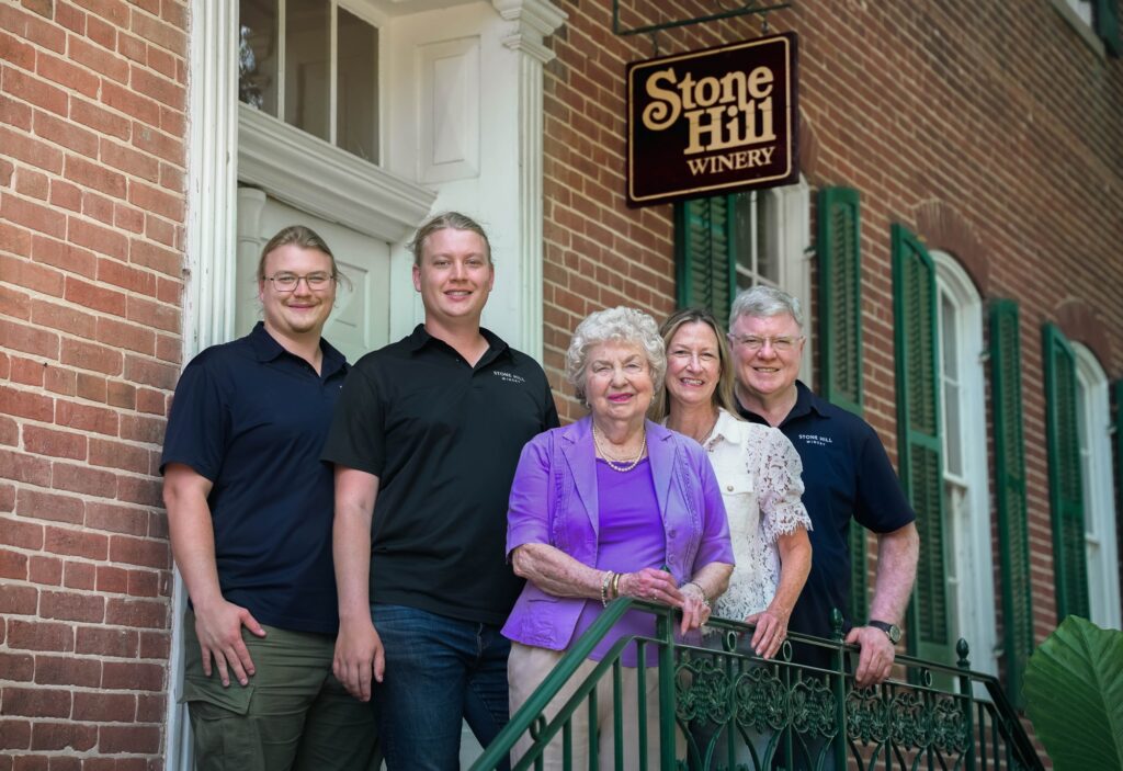 Nathan, Eric, Betty, Karen and Jon Held on the front steps of the Stone Hill Winery main building